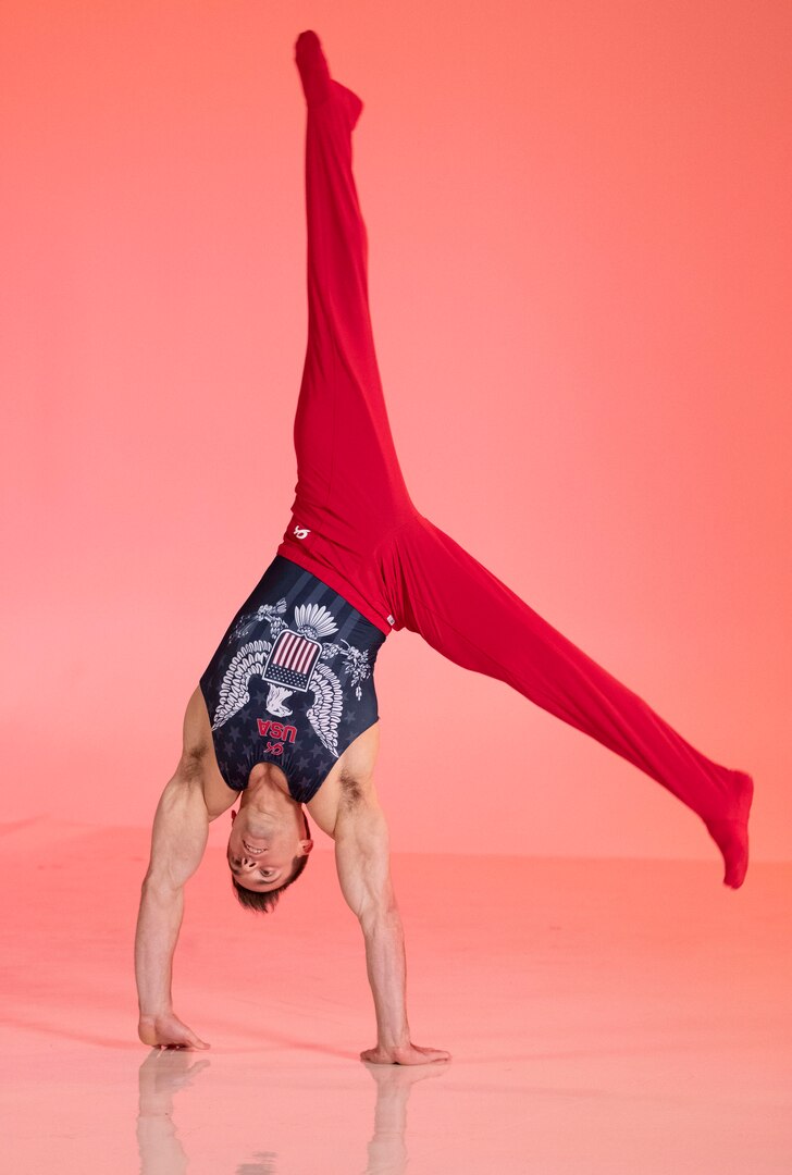 Sam Mikulak demonstrates a cartwheel. 